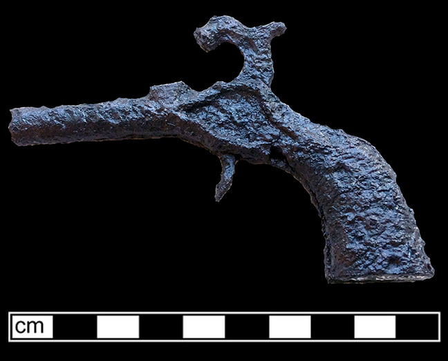 Cast ion toy cap pistol from 18MO609.